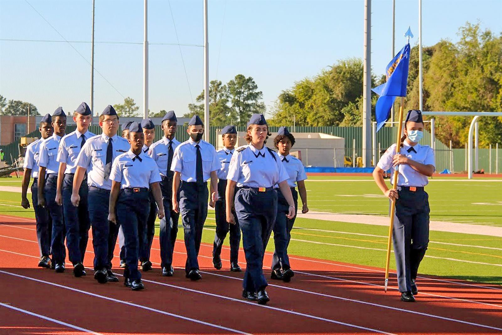 Cypress Creek Air Force JROTC’s Bravo Flight marches during the school’s first-ever Pass in Review.